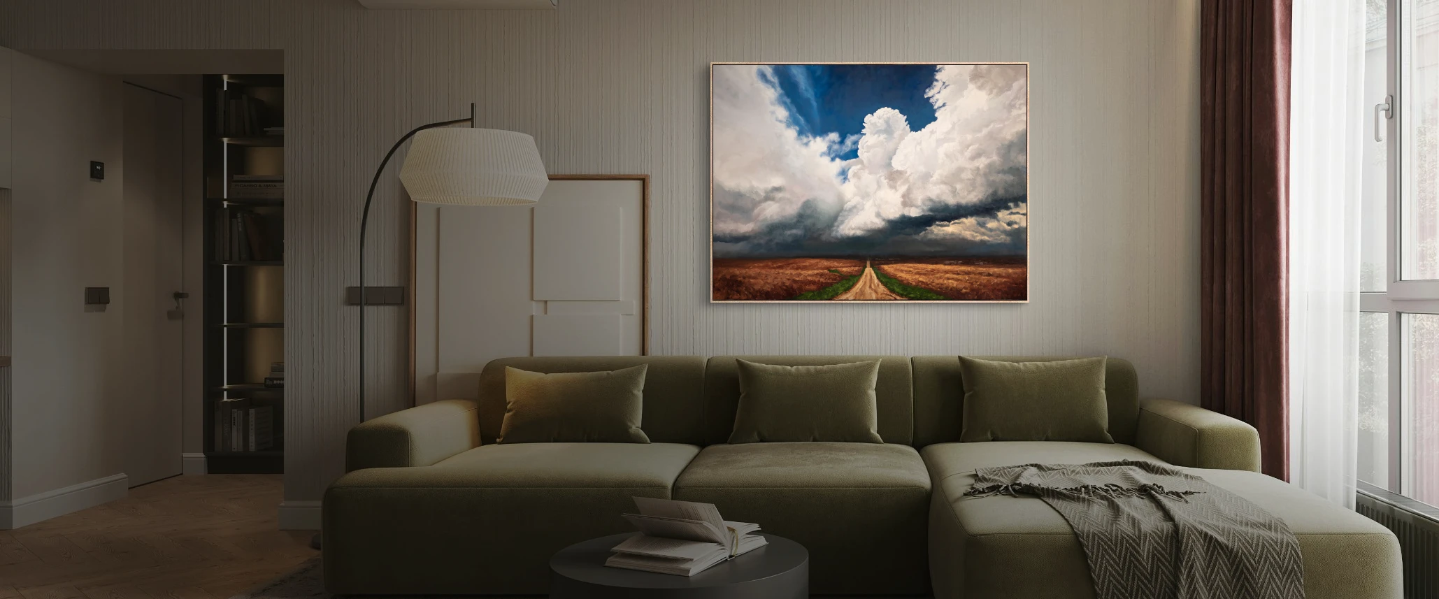 An original Jonathan Goodding sky painting hanging above a sofa in a living room