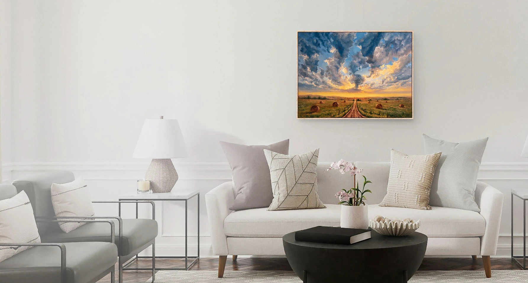 An original Jonathan Goodding sky painting hanging in a living room